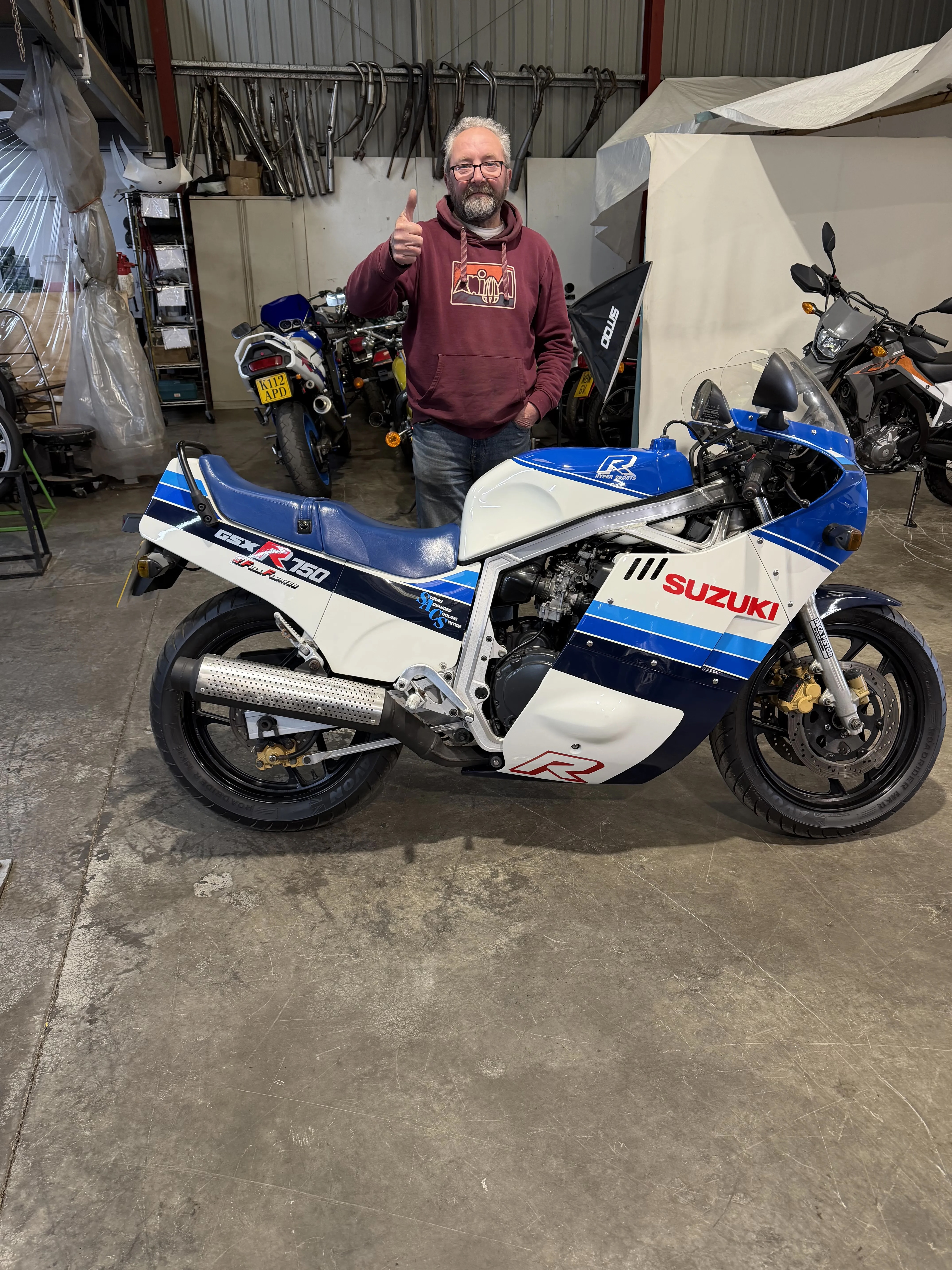 Andrew with his blue and white Suzuki GSX-R